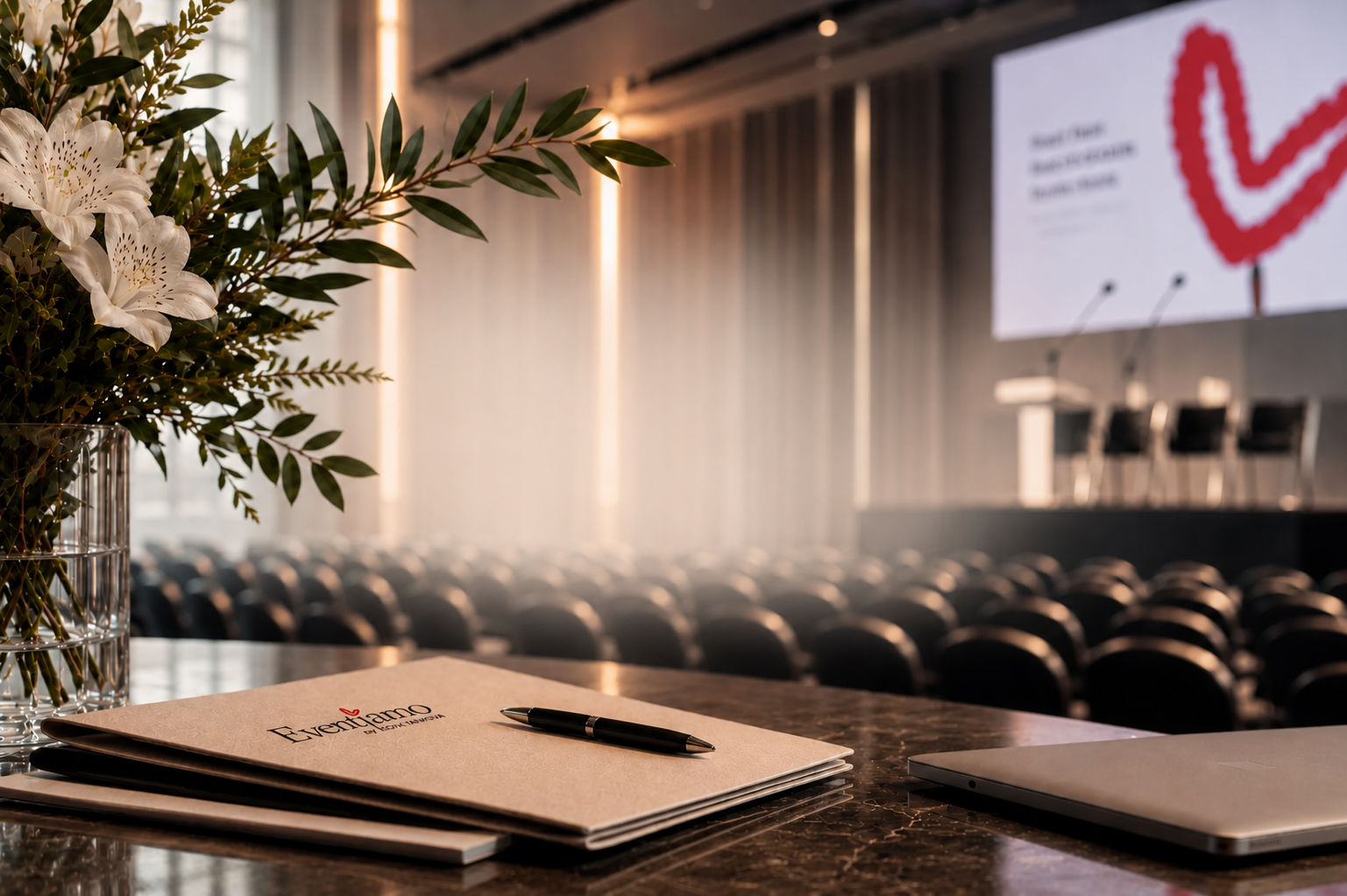 A prepared conference hall featuring Eventiamo branding